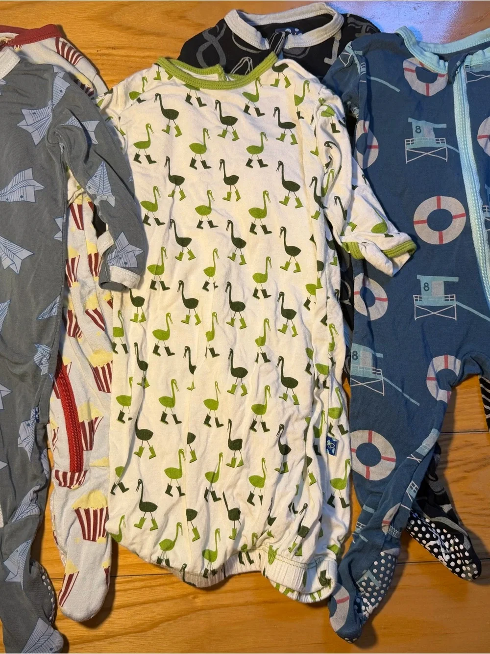 Kickee Pants Mixed Print Footed Sleepers in Blue, Green & Red